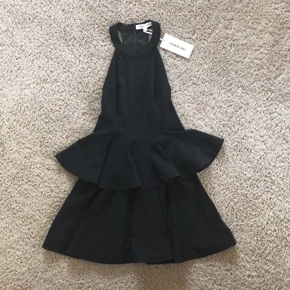 Flirty black halter peplum dress